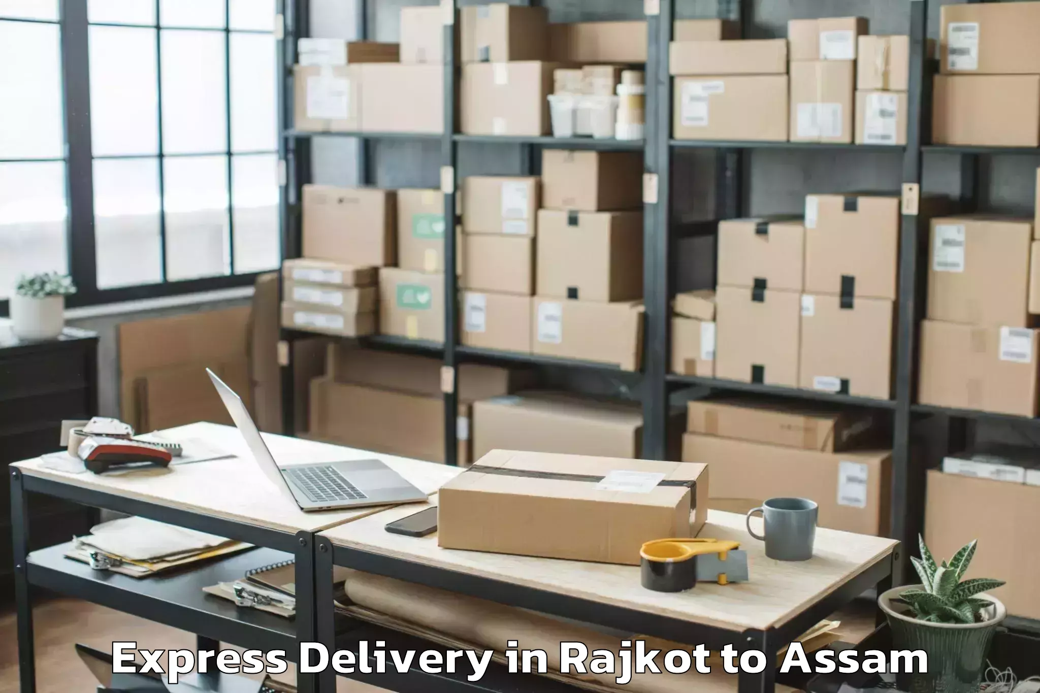 Book Rajkot to Salonibari Airport Tez Express Delivery